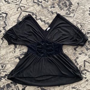 Free People black peplum S\P top